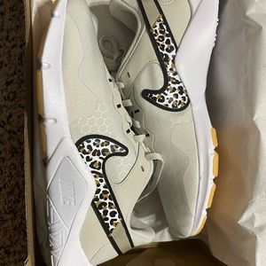 Womens Leopard Nike shoes. Brand new never worn. Size 8.5